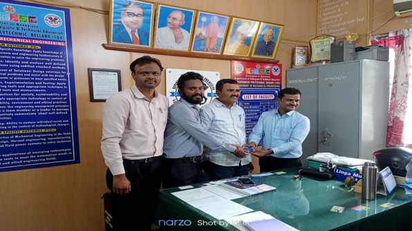 Shree Mahalaxmi Mahila Kala Sangha presenting a token of love to Government Polytechnic Mechanical HOD for service in education